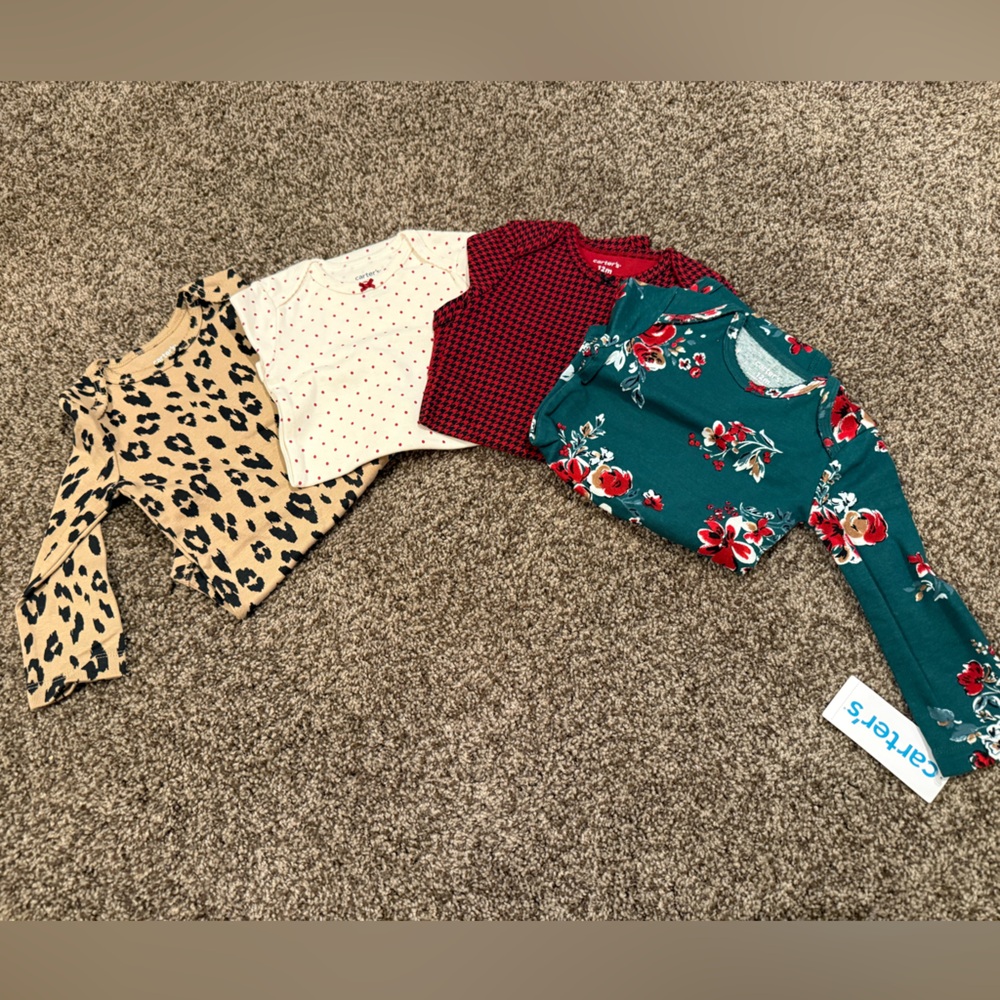 Set of 4 NWT Long sleeve onesies